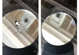 Technician repairing a windshield chip